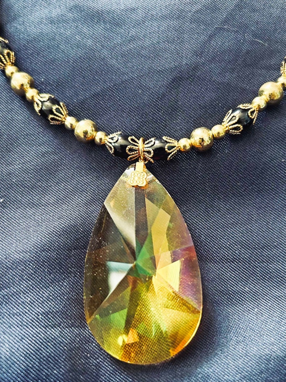 NECKLACE LARGE PEAR CRYSTAL YELLOW WITH BLACK BEADS & GOLD TONE BEADS AND TUBES,